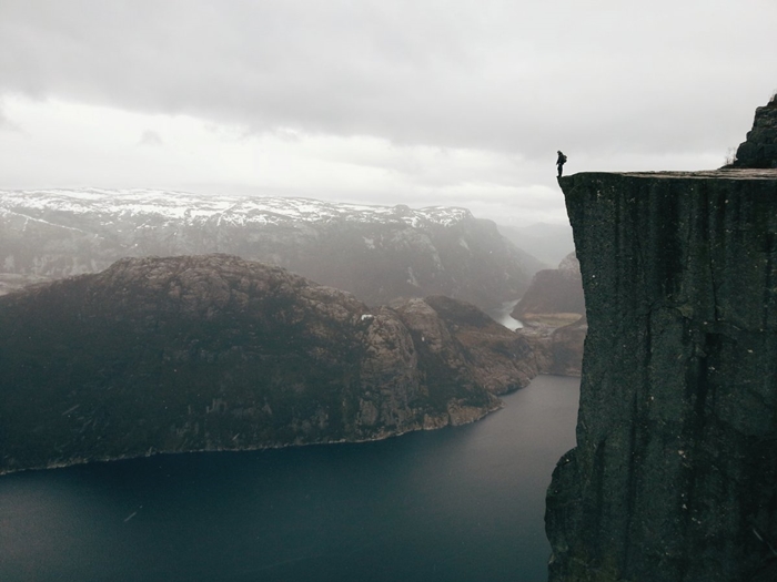 zonyand-a-man-stands-dangerously-close-to-the-edge-in-this-photo-by-atle-rnningen-of-norway