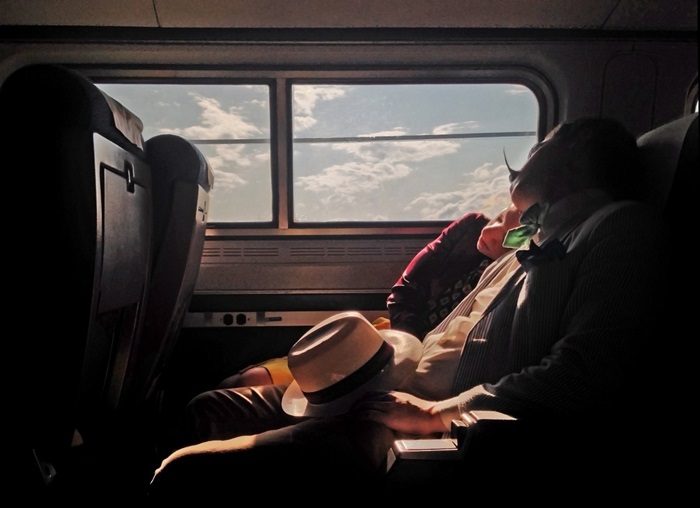 and-time-for-the-champions-yvonne-lu-captured-this-third-place-photo-while-traveling-back-to-new-york-city-on-a-train-the-couple-looks-like-they-dont-need-anything-else-in-the-worl