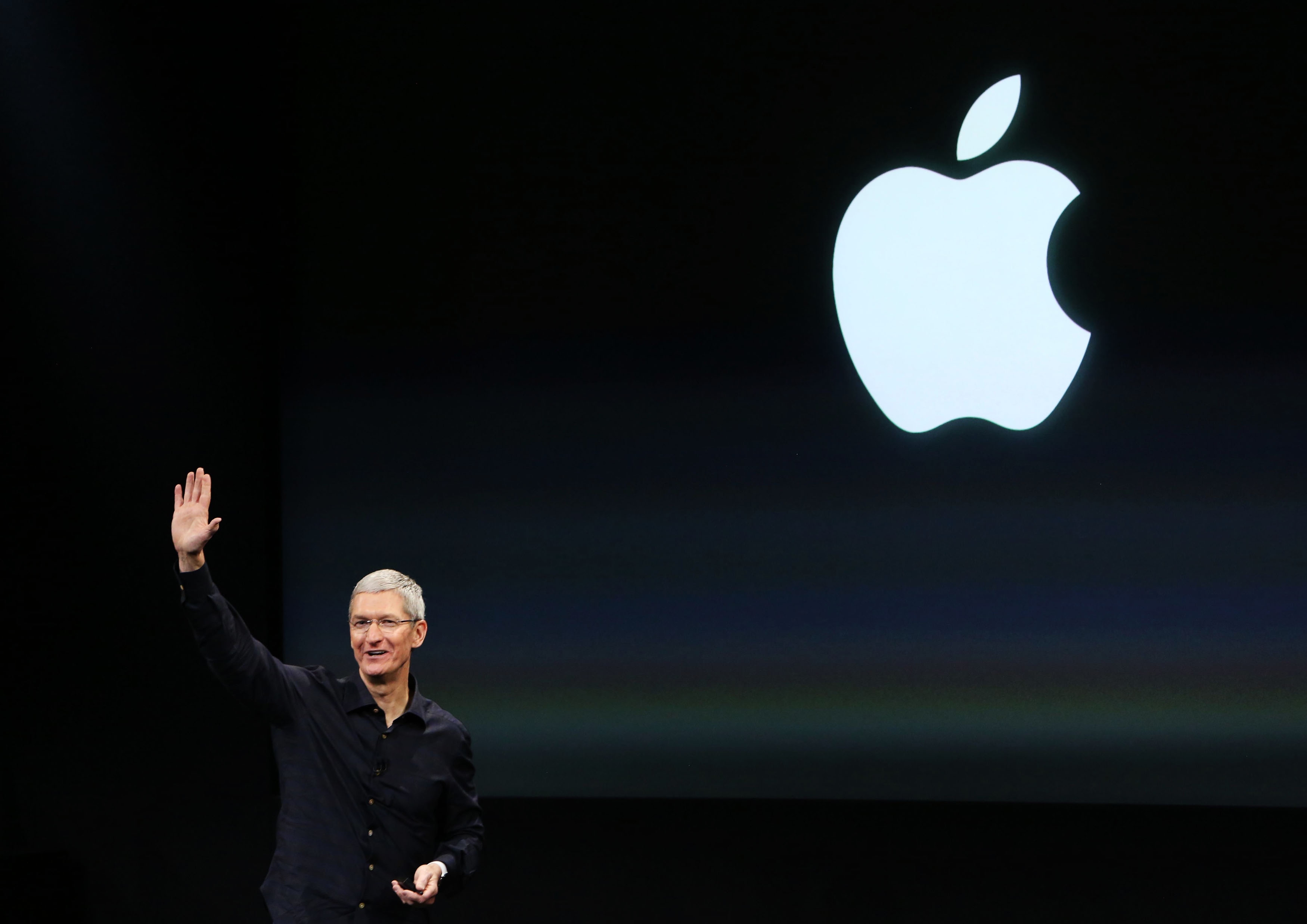 Apple CEO Tim Cook speaks during a presentation at Apple headquarters in Cupertino in this file photo