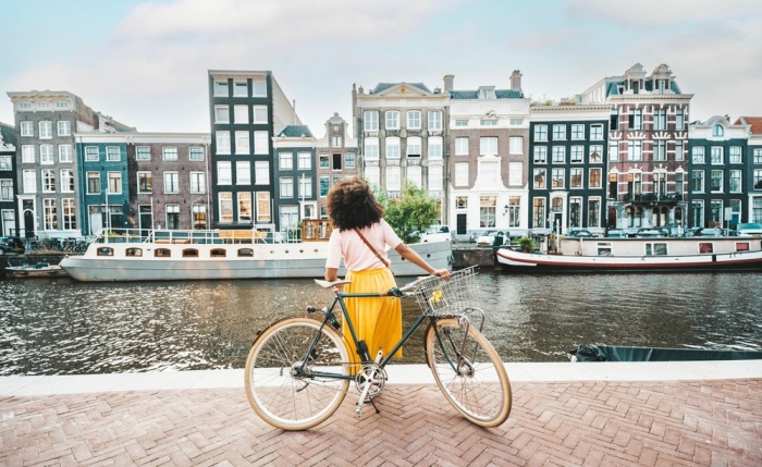 Happy,Female,Tourist,Visiting,Amsterdam,City,,Netherlands,-,Delightful,Woman